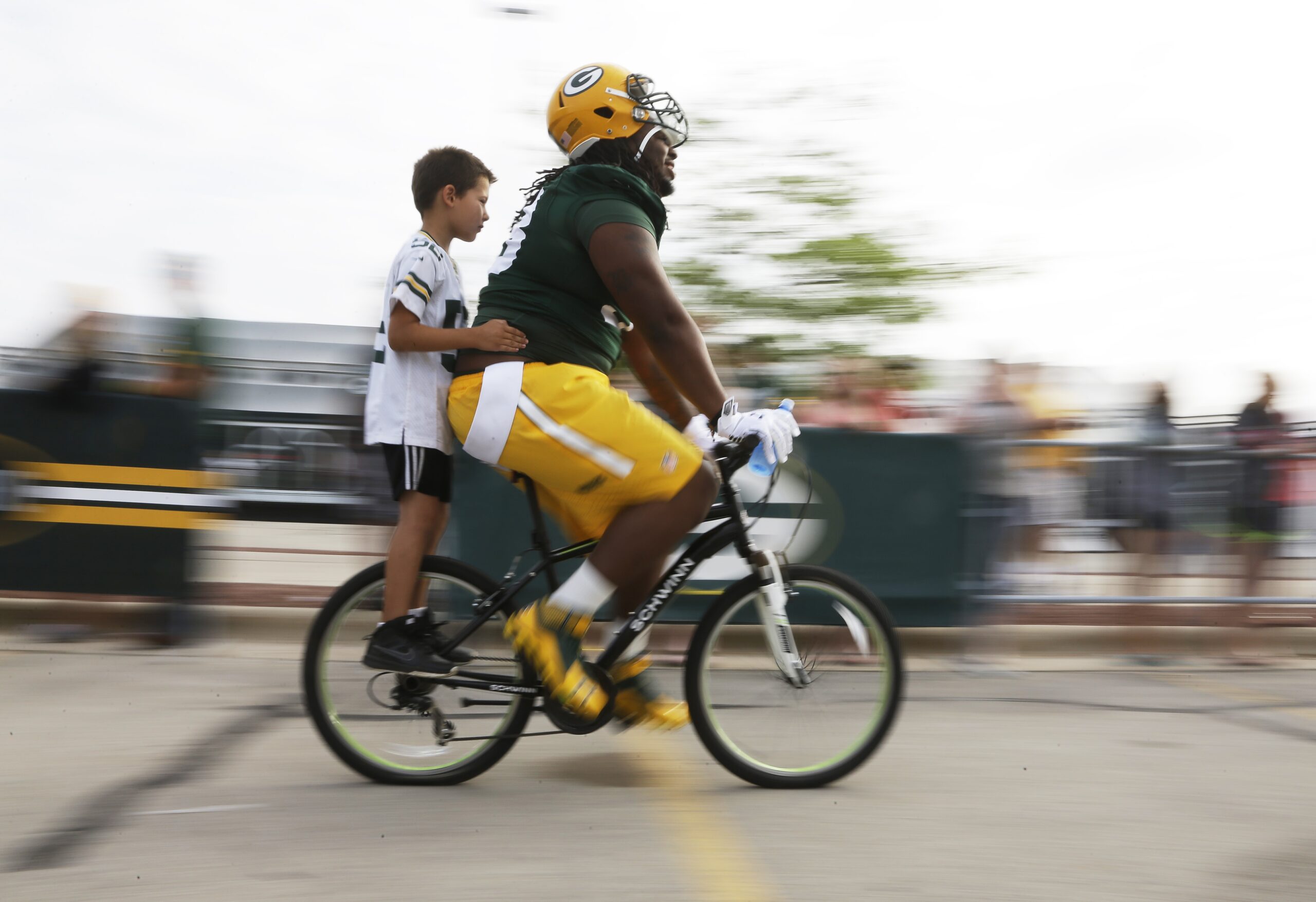 Why do Packers players ride tiny kids bikes to practice? | For The Win