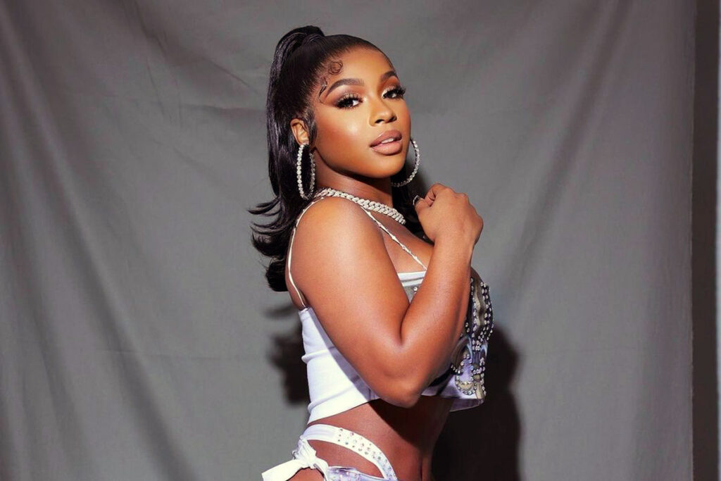 Reginae Carter Sizzles In A Skintight Mini Dress As She Flaunts Her ...
